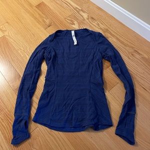 Lululemon long sleeve shirt. Color blue with black stripes. Size 4.